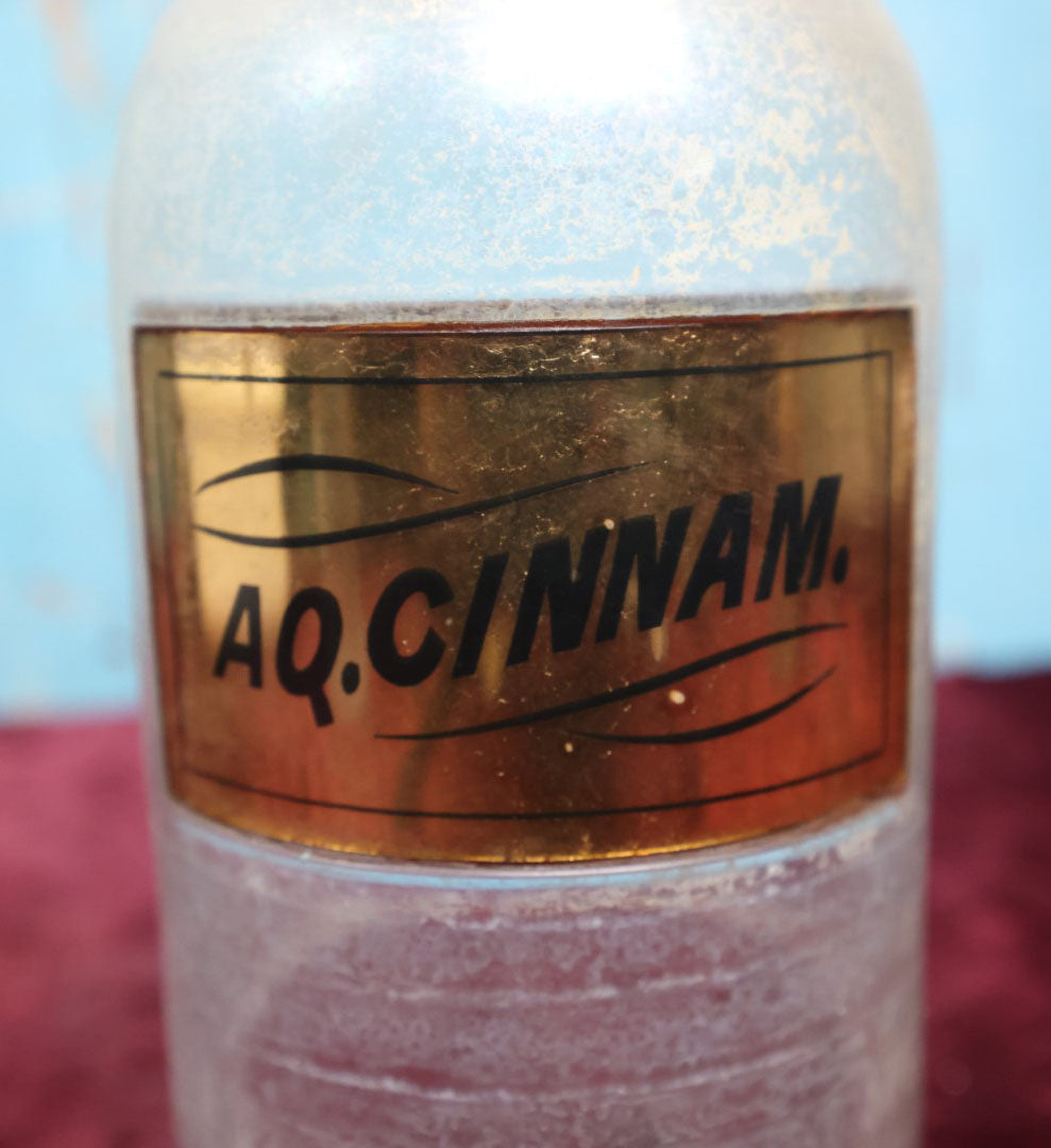 Lot 038 - Antique Cinnamon Water Apothecary Bottle With Glass "Aq. Cinnam." Label, Approximately 12"