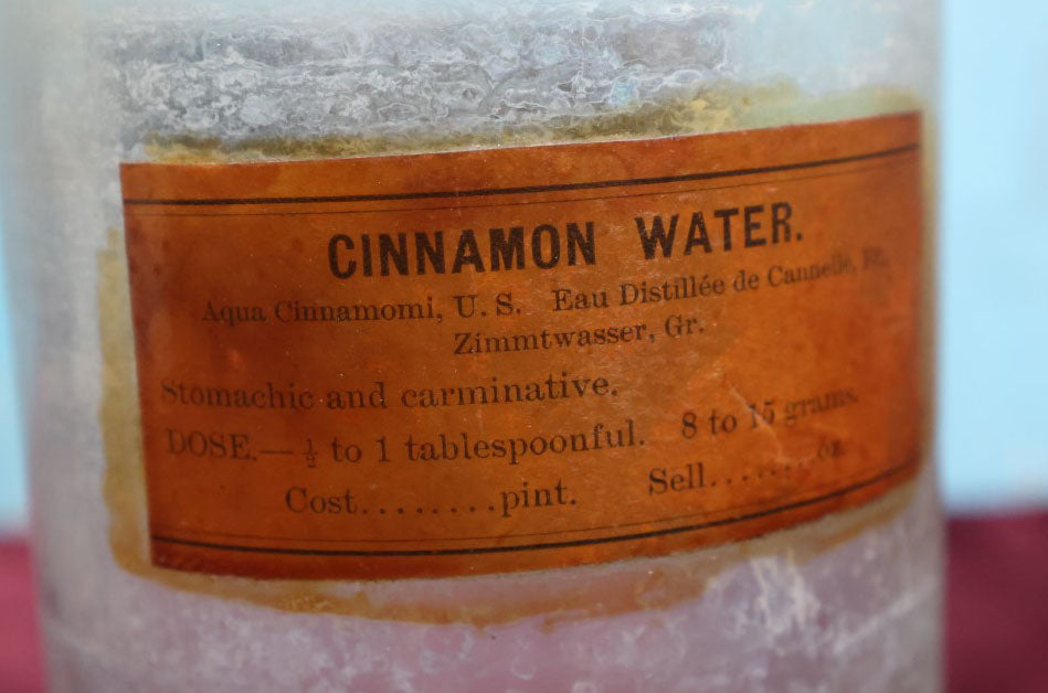 Lot 038 - Antique Cinnamon Water Apothecary Bottle With Glass "Aq. Cinnam." Label, Approximately 12"