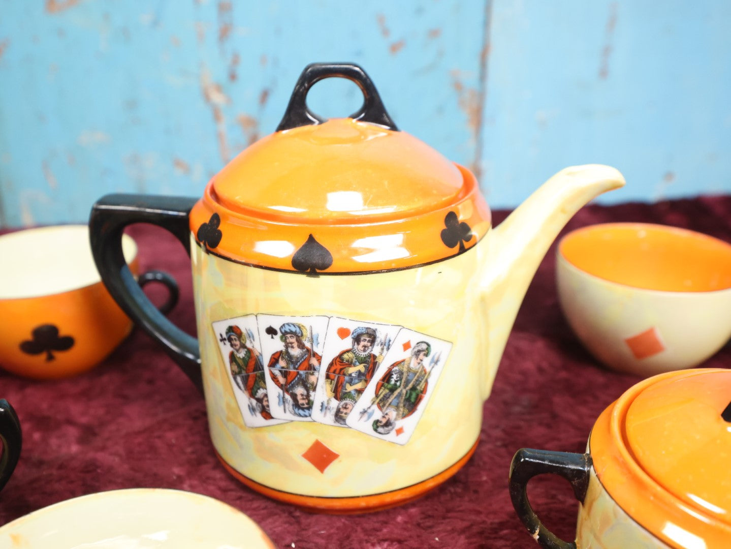 Lot 043 - Rudolf Wächter German Porcelain Lusterware Tea Set With Playing Card Motif, Includes Teapot, Sugar Bowl, Creamer, And Three Of Four Cups, Note Break On Sugar Bowl Arm