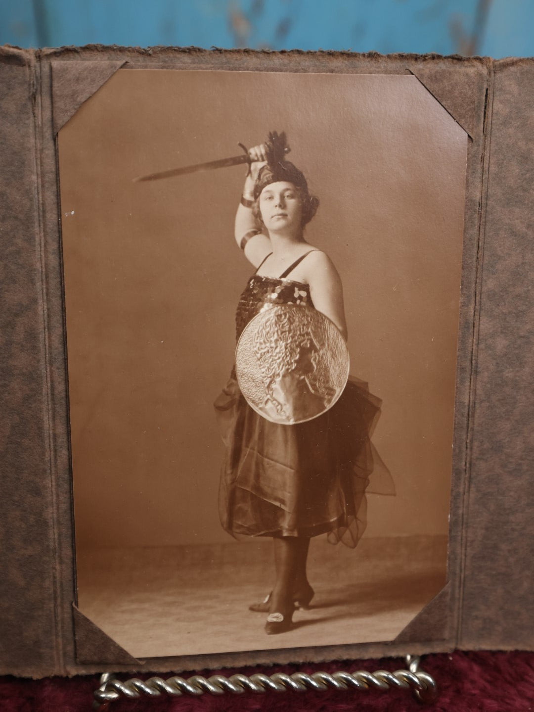 Lot 060 - Single Dancer Portrait Photo, Woman Holding Figural Shield And Sword In Costume, Godin Studios Photographer, Manchester, New Hampshire