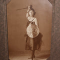 Lot 060 - Single Dancer Portrait Photo, Woman Holding Figural Shield And Sword In Costume, Godin Studios Photographer, Manchester, New Hampshire