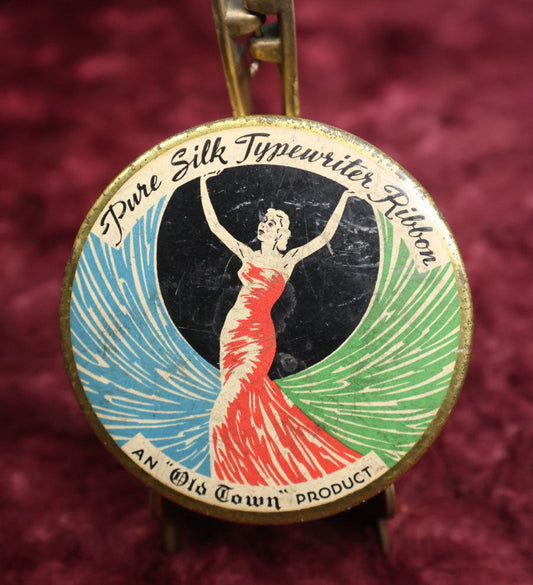 Lot 082 - Vintage Old Town Pure Silk Typewriter Ribbon Tin With Woman In Dress, Blue, Red, And Green Colors, Made In New York, U.S.A., For Remington, With Bobby Pin Contents