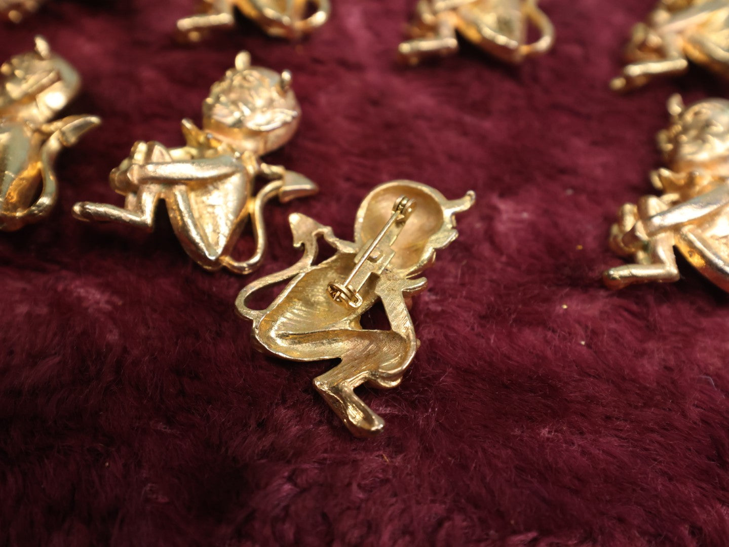 Lot 083 - Eight Vintage Brass Little Devil "Hot Stuff" Pinback Pins, Brooches Grouping (Group #4)