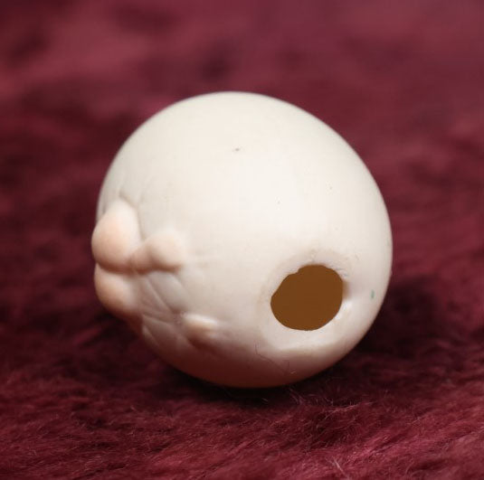 Lot 087 - Antique Bisque Porcelain "Birthing Egg," Baby Breaking Out Of Egg, Butt On Back, Hole In Bottom, Likely German