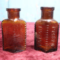 Lot 092 - Pair Of Antique Amber Glass Poison Bottles, One With Poison Written Twice, Another Just Once, Sold As Pair