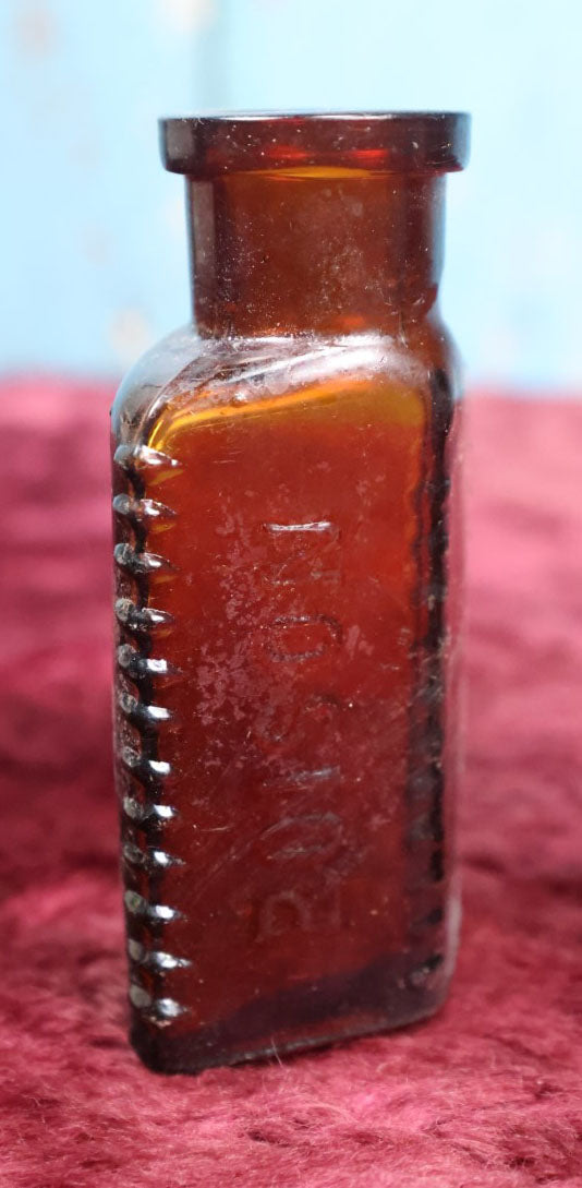 Lot 092 - Pair Of Antique Amber Glass Poison Bottles, One With Poison Written Twice, Another Just Once, Sold As Pair