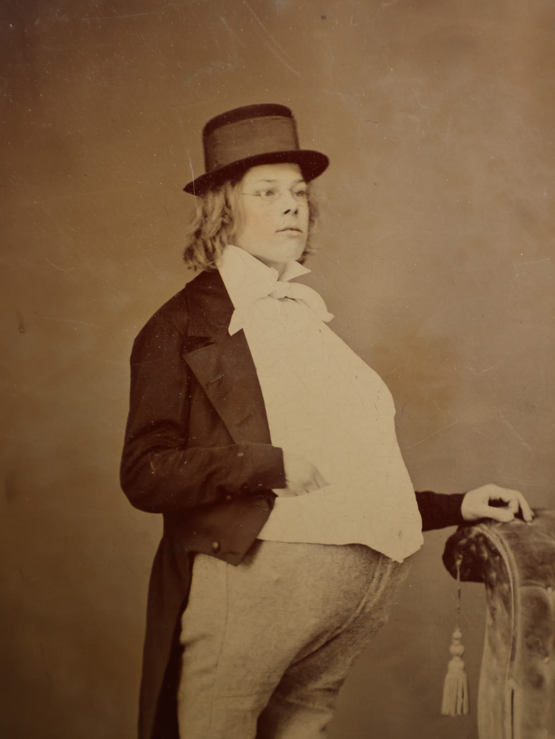 Lot 107 - Antique Tintype Photograph Of Young Man Dressed In Portly Costume, Hat, Approximately 1/2 Plate, Note Bend On Bottom