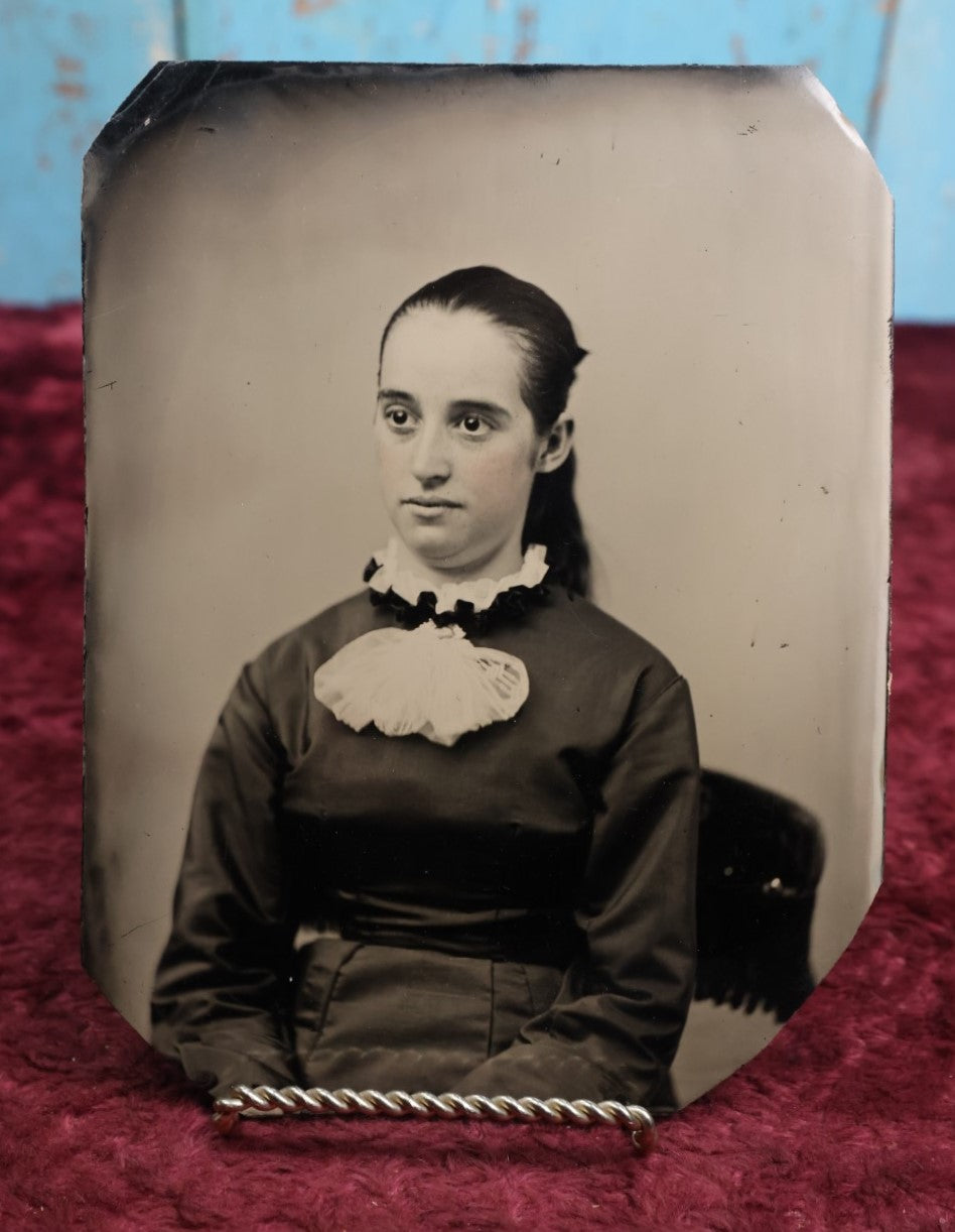 Lot 109 - Antique Tintype Photo Of Pretty Young Woman With Large Eyes, Ponytail, Approximately Full Plate