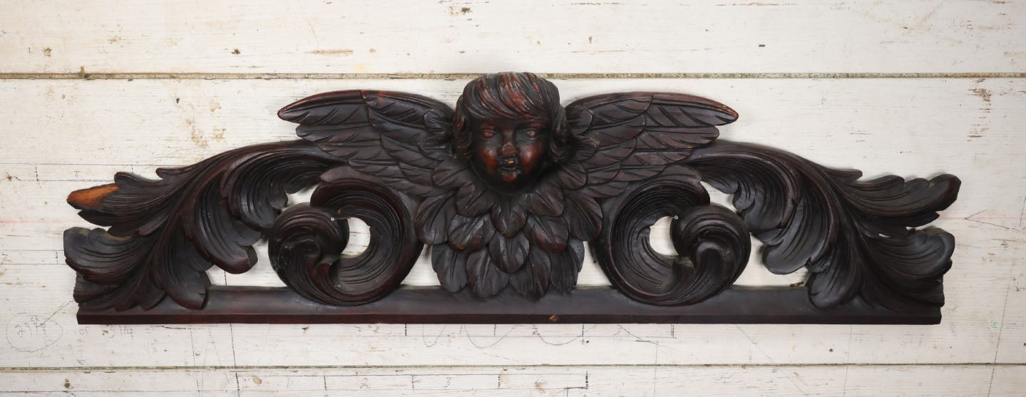 Lot 001 - Antique Salvaged Carved Wooden Furniture Fragment With Winged Cherub - 32.75" Long