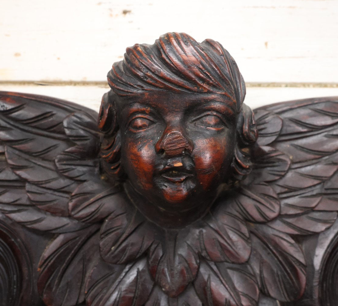 Lot 001 - Antique Salvaged Carved Wooden Furniture Fragment With Winged Cherub - 32.75" Long