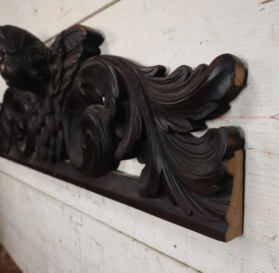 Lot 001 - Antique Salvaged Carved Wooden Furniture Fragment With Winged Cherub - 32.75" Long