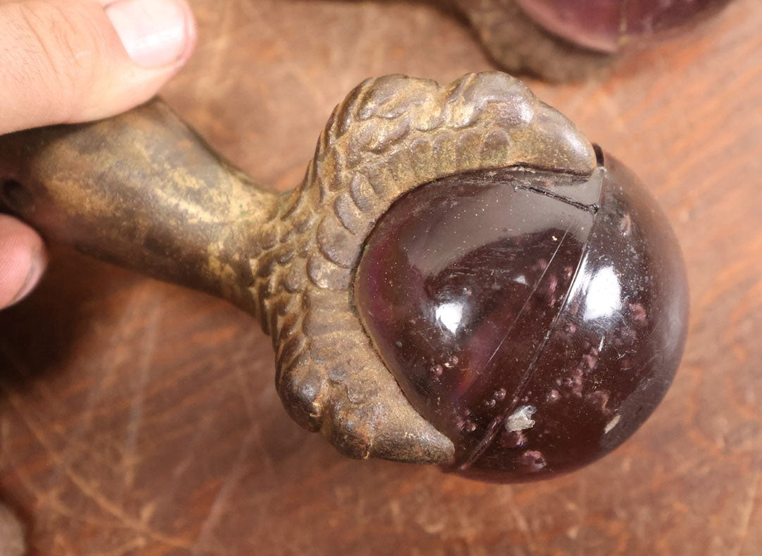 Lot 008 - Grouping Of Four Large Size Cast Iron And Glass Ball And Claw Furniture Feet With Purple Glass Balls