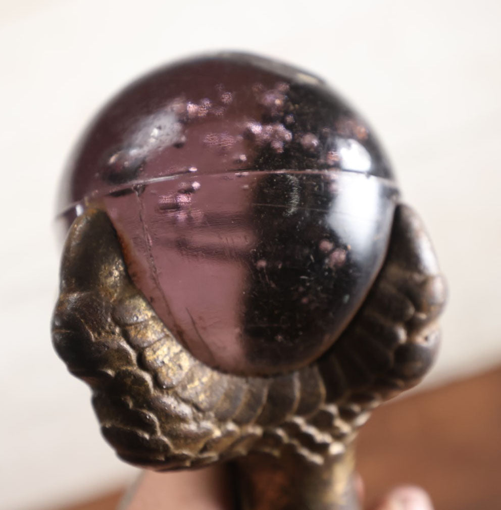 Lot 008 - Grouping Of Four Large Size Cast Iron And Glass Ball And Claw Furniture Feet With Purple Glass Balls