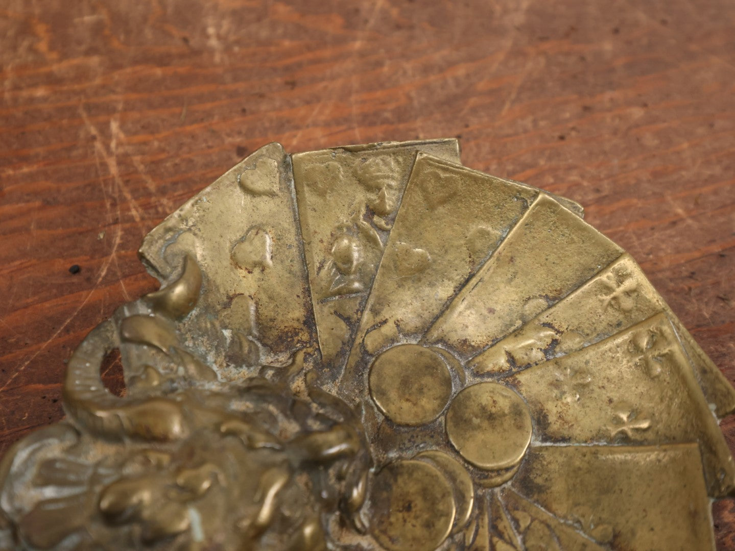 Lot 009 - Antique Brass Lucky Devil Coin And Card Dish Depicting A Snarling Horned Demon, Playing Cards, And Coins