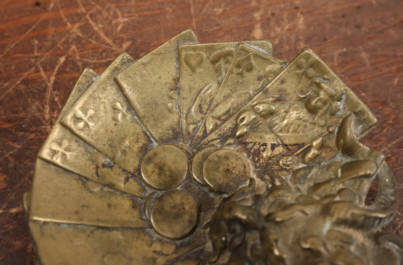 Lot 009 - Antique Brass Lucky Devil Coin And Card Dish Depicting A Snarling Horned Demon, Playing Cards, And Coins