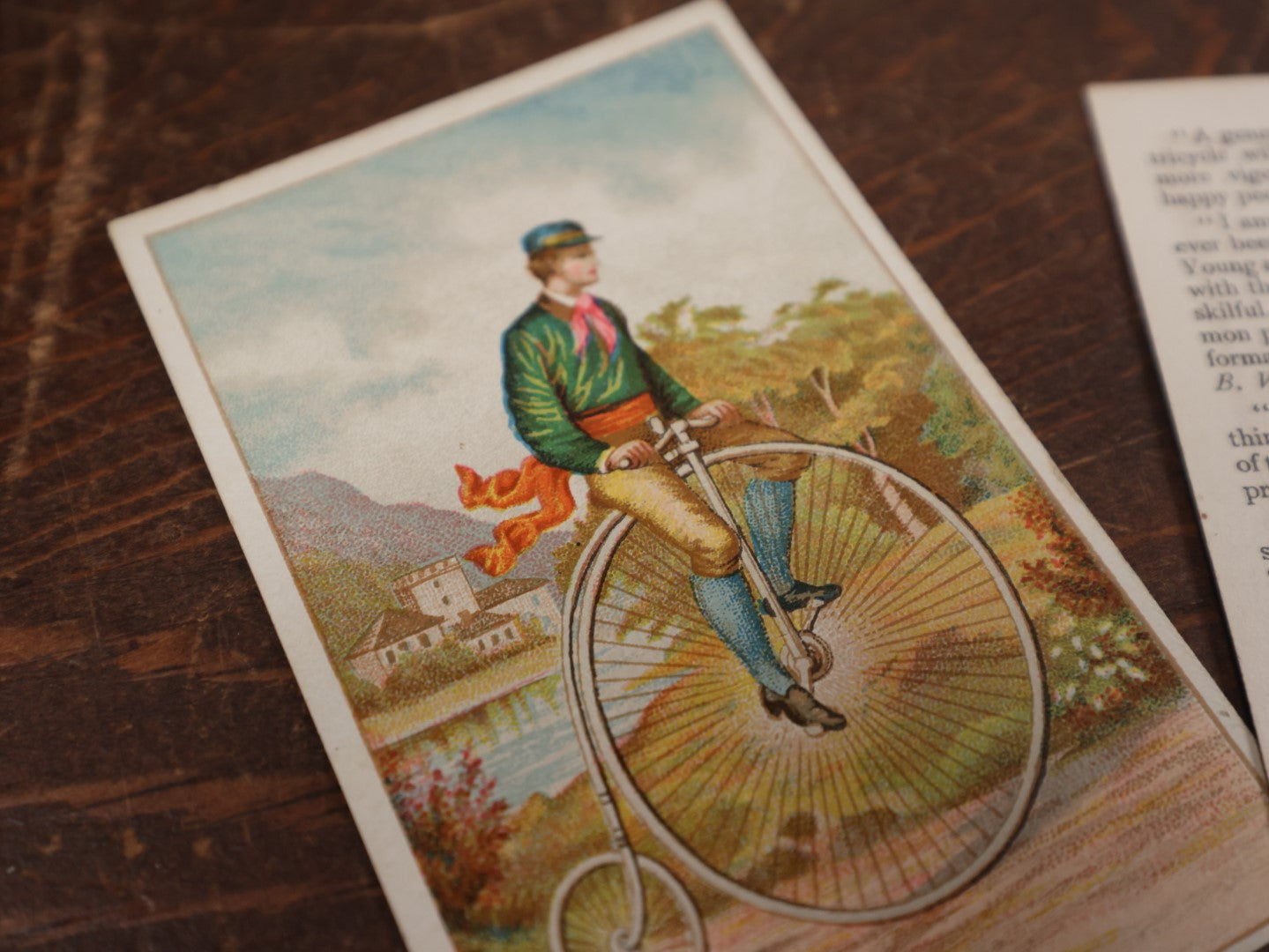 Lot 171 - Grouping Of Three Pieces Of Antique Bicycle Ephemera Including Columbia Bicycles, Player's Cigarette Card, And More