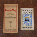 Lot 178 - Pair Of Pieces Of Train Ephemera - Boston And Maine Railroad Tourist Map, Union Pacific & Michigan Central Railroad Book Of Trains
