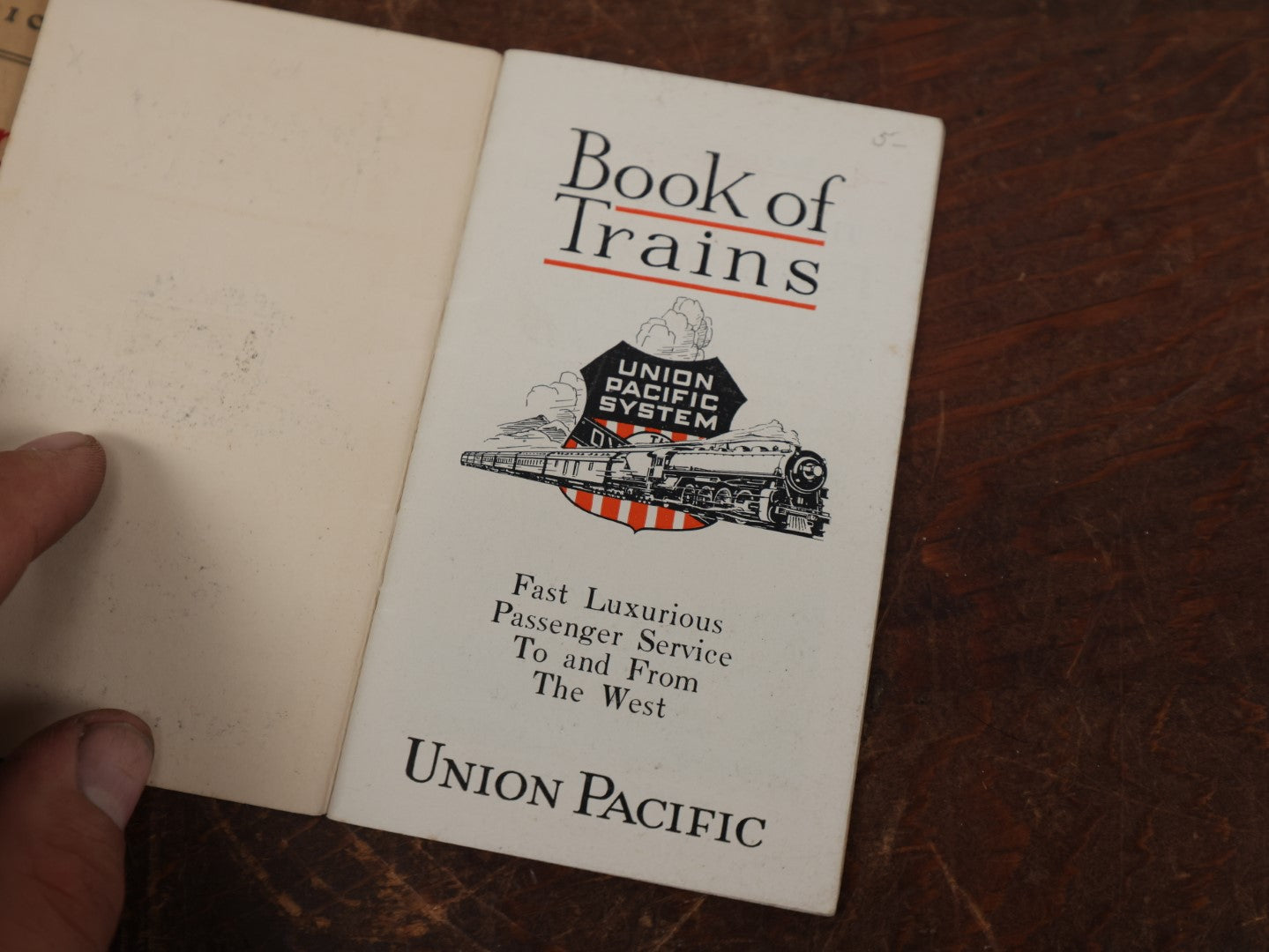 Lot 178 - Pair Of Pieces Of Train Ephemera - Boston And Maine Railroad Tourist Map, Union Pacific & Michigan Central Railroad Book Of Trains