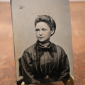 Lot 182 - Single Tintype Photo, Young Woman Looking To Left, Brooch On Collar, Hair Hanging In Ponytail On Left