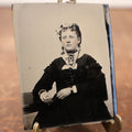 Lot 183 - Single Tintype Photo, Young Woman With Bow In Hair, Many Necklaces, Brooch, Ring