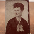 Lot 186 - Single Tintype Photo, Young Woman With Earrings, Decorated Tie With Floral Design