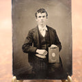 Lot 188 - Single Tintype Photo, Young Man Holding Book That Says "Glory, Immortal Life"