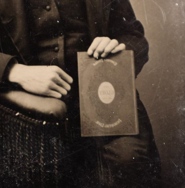 Lot 188 - Single Tintype Photo, Young Man Holding Book That Says "Glory, Immortal Life"