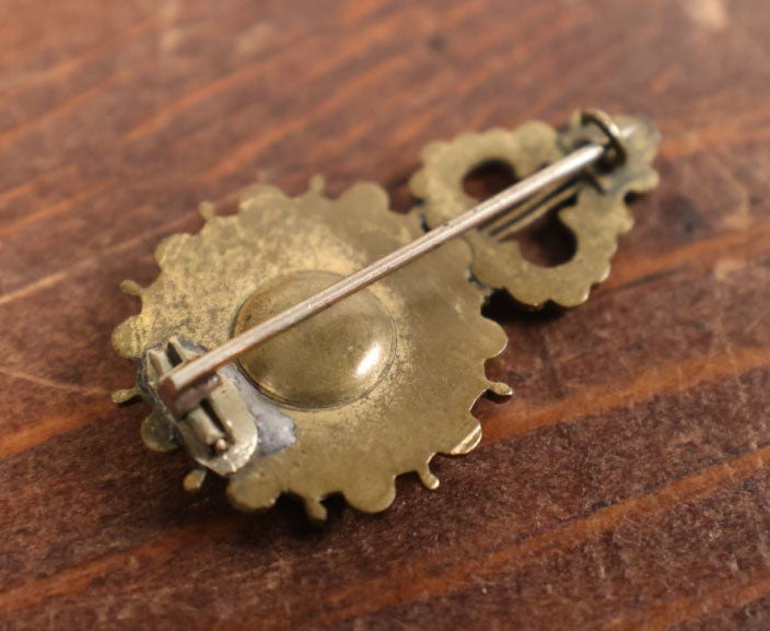 Lot 022 - Antique Brass Brooch With Black Stones And Woven Hair Under Glass Windows At Center, Note Scuff, Missing Stones