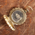Lot 024 - Antique Brass And Blue Enamel Locket Containing A Miniature Daguerreotype Of A Pretty Young Woman