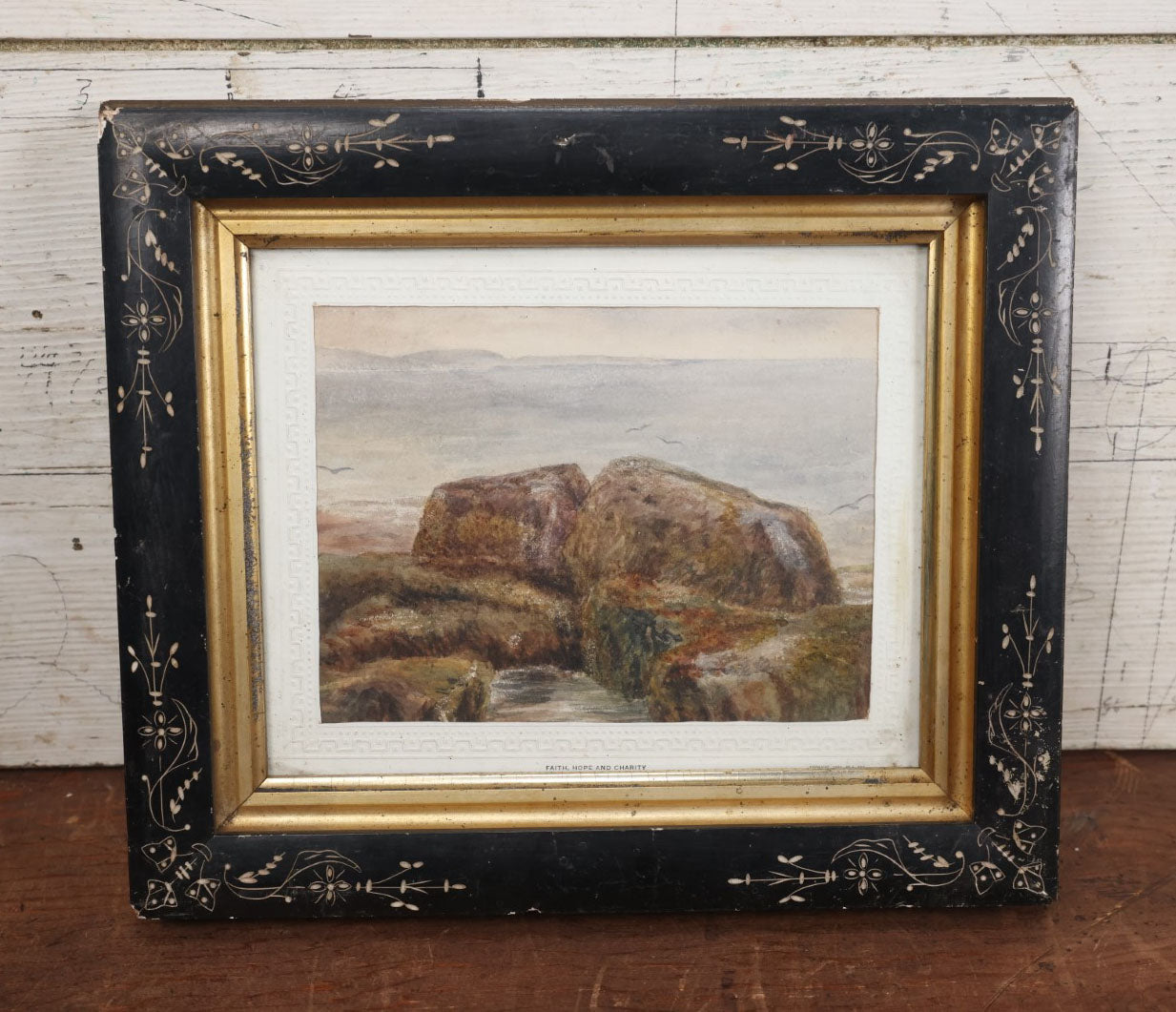 Lot 029 - Antique Watercolor Seascape Painting Of Rocks On Shore, Seagulls, Sky, In Antique Ebony Etched Wood Eastlake Frame