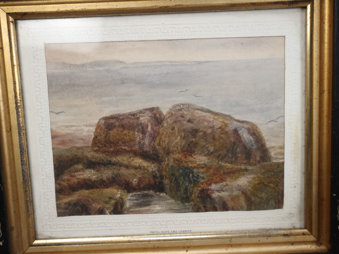 Lot 029 - Antique Watercolor Seascape Painting Of Rocks On Shore, Seagulls, Sky, In Antique Ebony Etched Wood Eastlake Frame