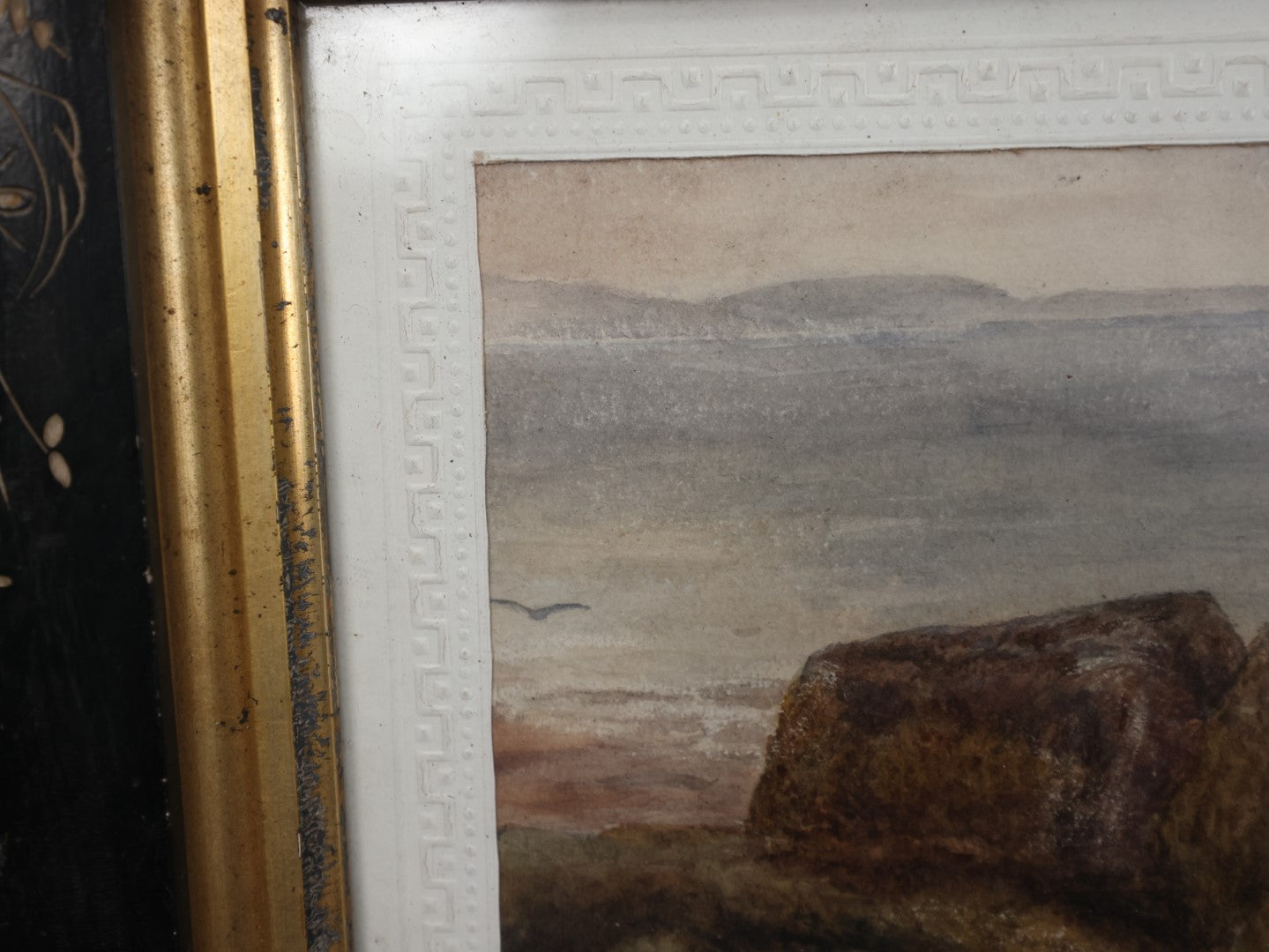 Lot 029 - Antique Watercolor Seascape Painting Of Rocks On Shore, Seagulls, Sky, In Antique Ebony Etched Wood Eastlake Frame