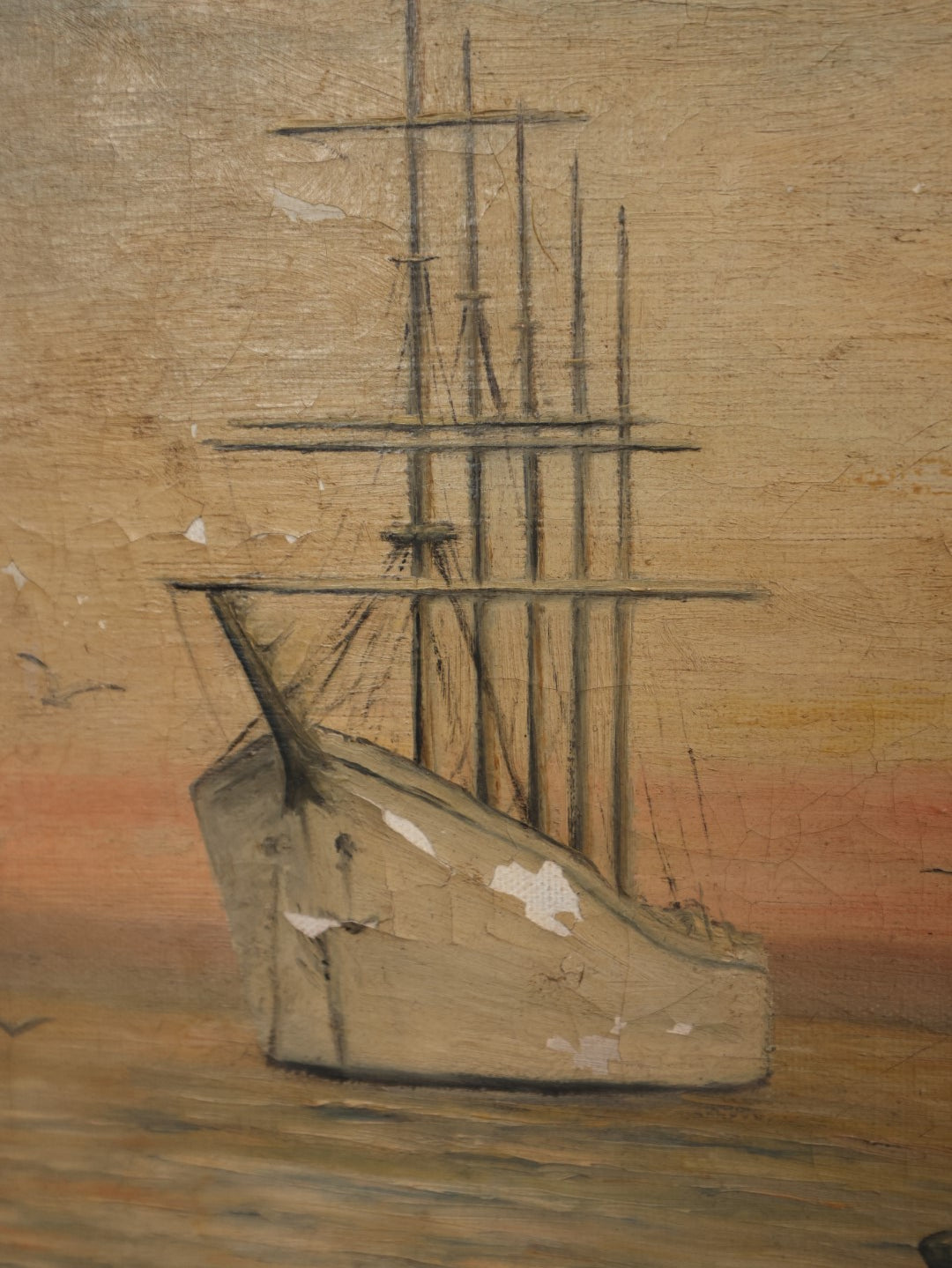 Lot 030 - Antique Oil On Canvas Painting Of A Tall Ship With Colorful Sunset Sky, Seagulls, Note Losses To Paint