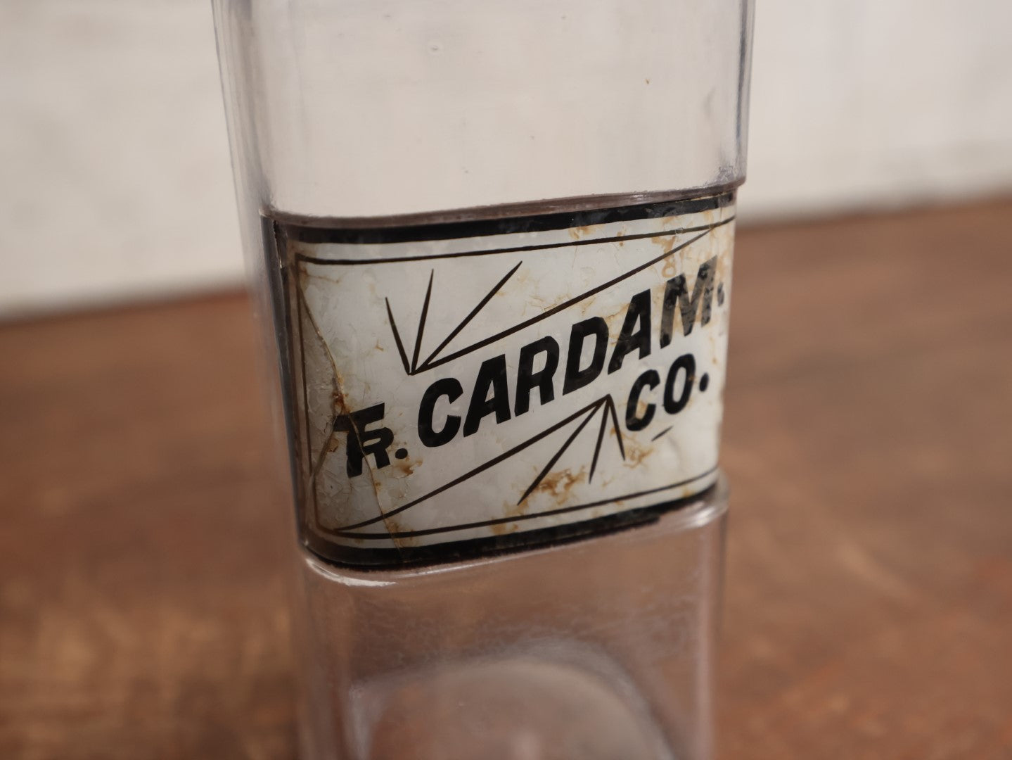 Lot 056 - Antique Apothecary Bottle With Glass Label, Tincture Of Cardamom, Note Crack In Label, Includes Stopper