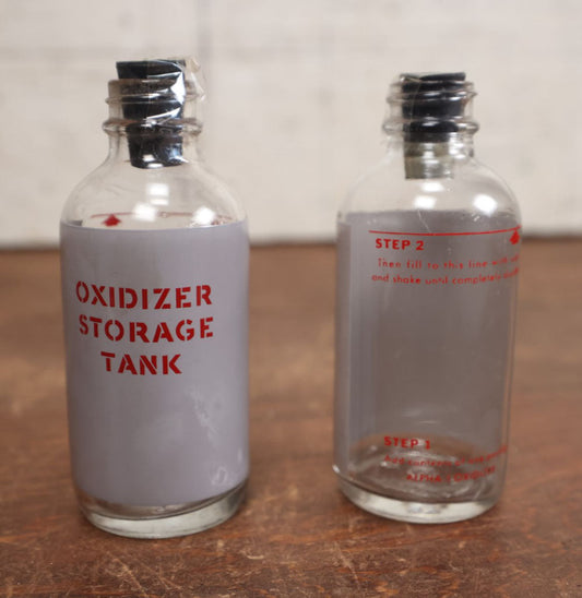 Lot 060 - Pair Of Vintage Oxidizer Storage Tank Glass Medical Bottles By Duraglass