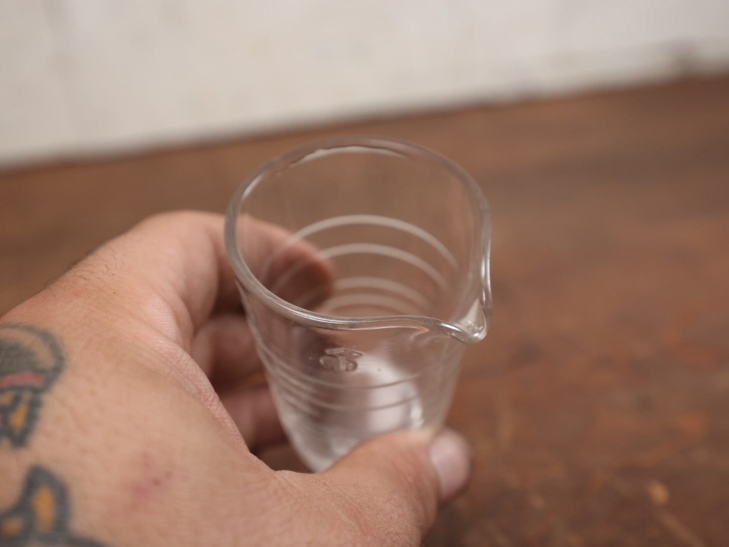 Lot 063 - Vintage 3 Ounce Glass Medicine Measuring Cup With Embossed Hash Marks