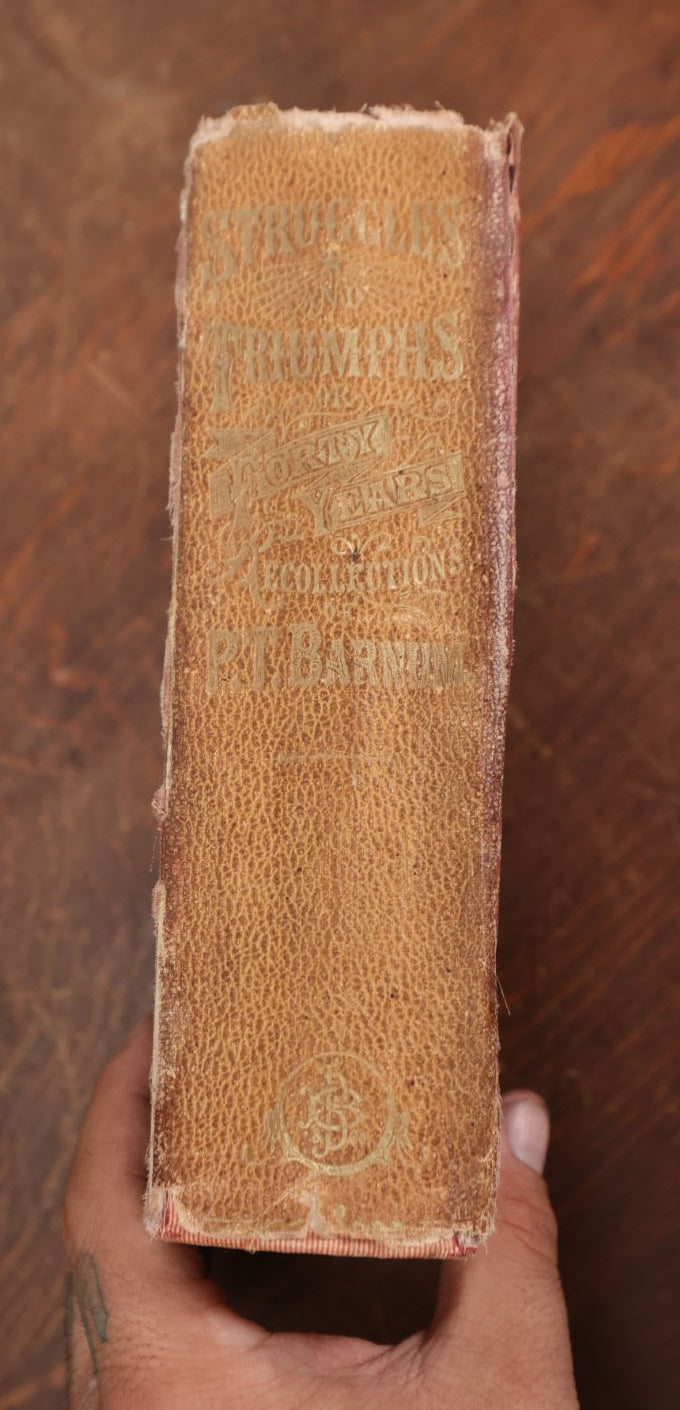 Lot 064 - Struggles And Triumphs Or Forty Years' Recollections Of P.T. Barnum, Written By Himself, Phineas T. Barnum Autobiography, 1870, Illustrated By Fay & Cox, Note Wear To Spine, Binding