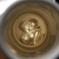 Lot 074 - Vintage Lithophane Frankfurt Germany Beer Stein Showing Man Woman Kissing And Groping When Held Up To Light