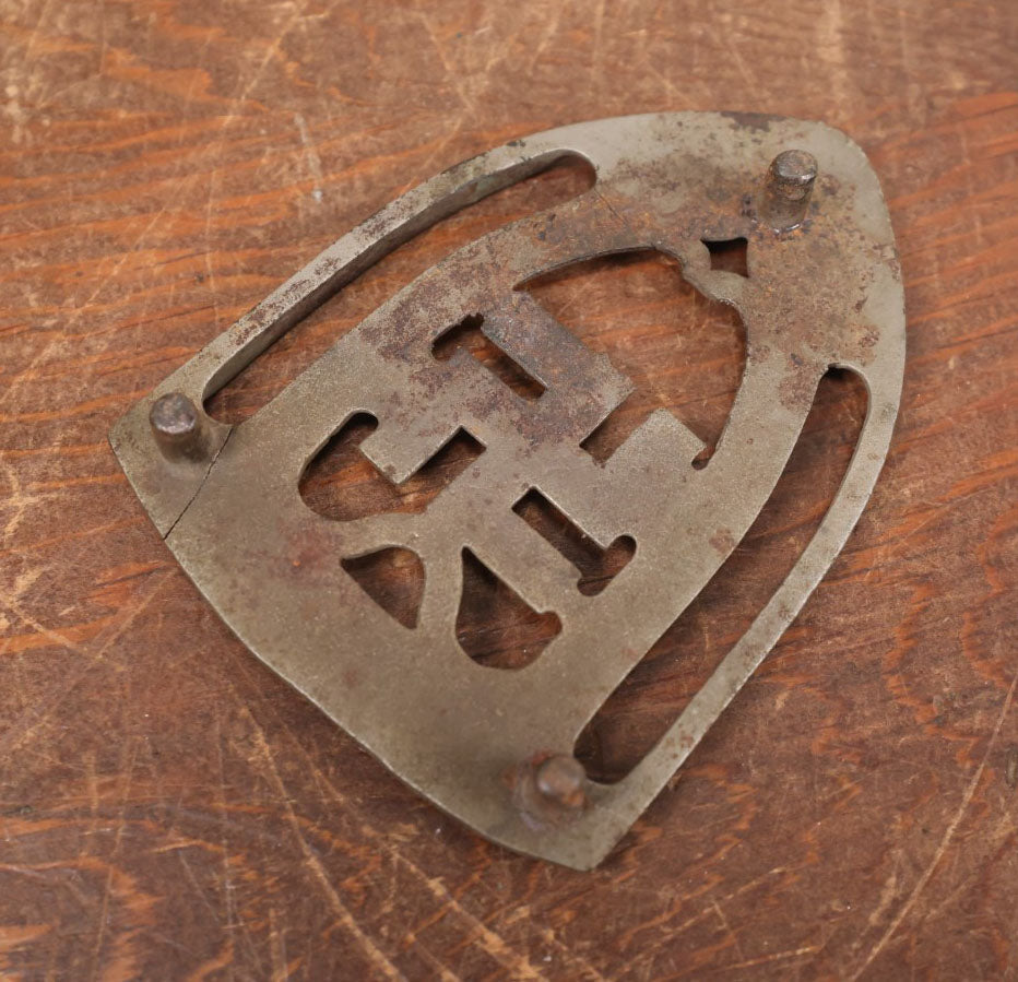 Lot 078 - Antique Cast Iron Sad Iron Trivet With "Whirling Logs" Swastika Motif, A Pre-Nazi Symbol Of Good Luck, Note Two Cracks, Please See Description