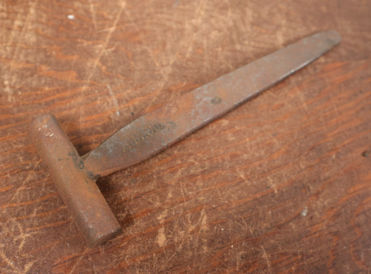 Lot 085 - Cast Iron T-Handle Hammer And Multi Tool Marked A.M. Co.