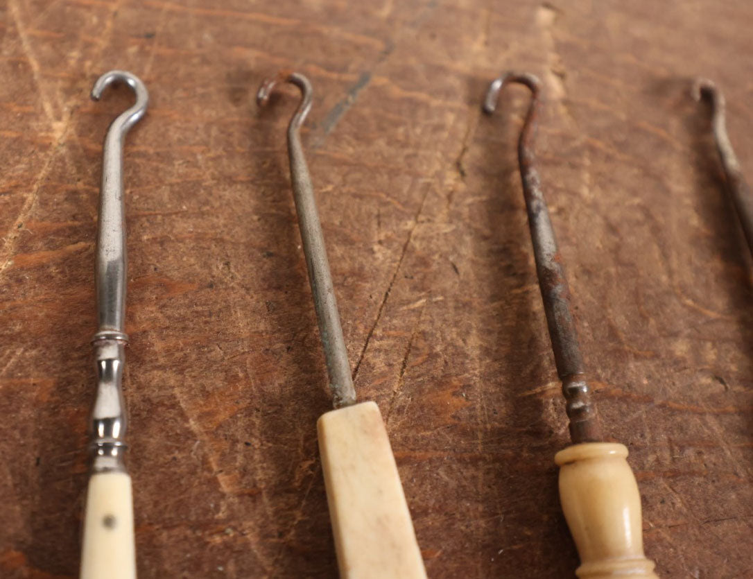 Lot 092 - Grouping Of Six Antique Shoe Button Hooks With Bone Handles