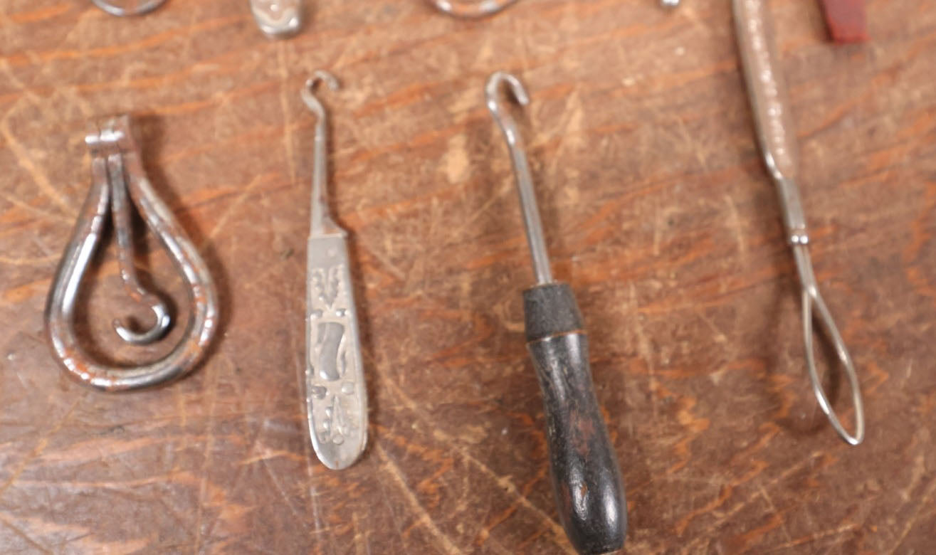 Lot 097 - Grouping Of Sixteen Various Antique Metal Shoe Button Hooks