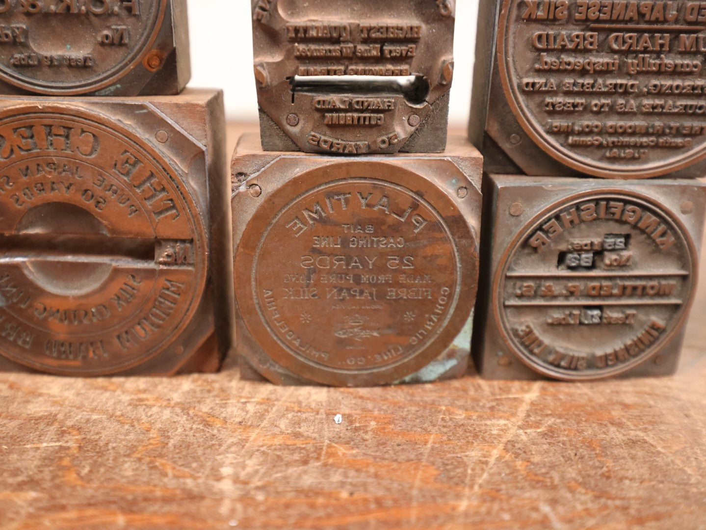 Lot 101 - Grouping Of Twelve Antique Fishing Line Advertising Print Block Letterpress, Various Brands Including Blue Queen, Playtime, Kingfisher, Etc.