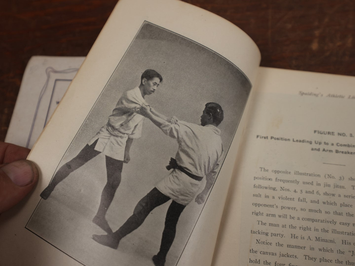 Lot 122 - Spalding's Athletic Library, "Jiu Jitsu: The Effective Japanese Mode Of Self Defense," With Photos Of K. Koyama And A. Minimi, Copyright 1905, American Sports Publishing Co., New York, 