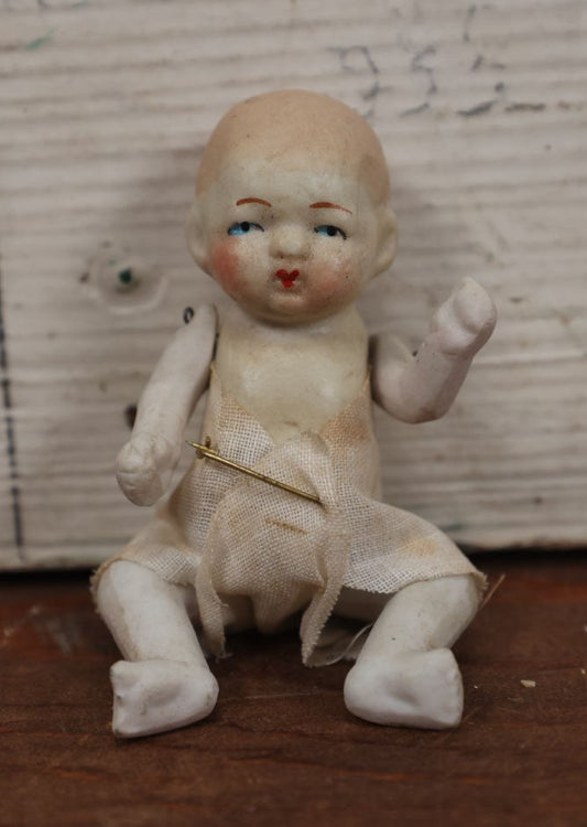 Lot 153 - Antique Miniature Bisque Jointed Baby Doll, Cloth Diaper With Safety Pin