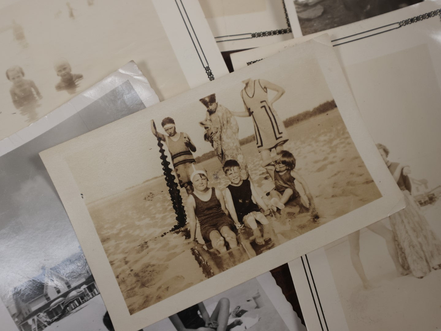 Lot 167 - Grouping Of Approximately 35 Vintage Snapshot Photos Of Women, Men, And Children At The Beach, Outdoors, In Swimsuits, Etc