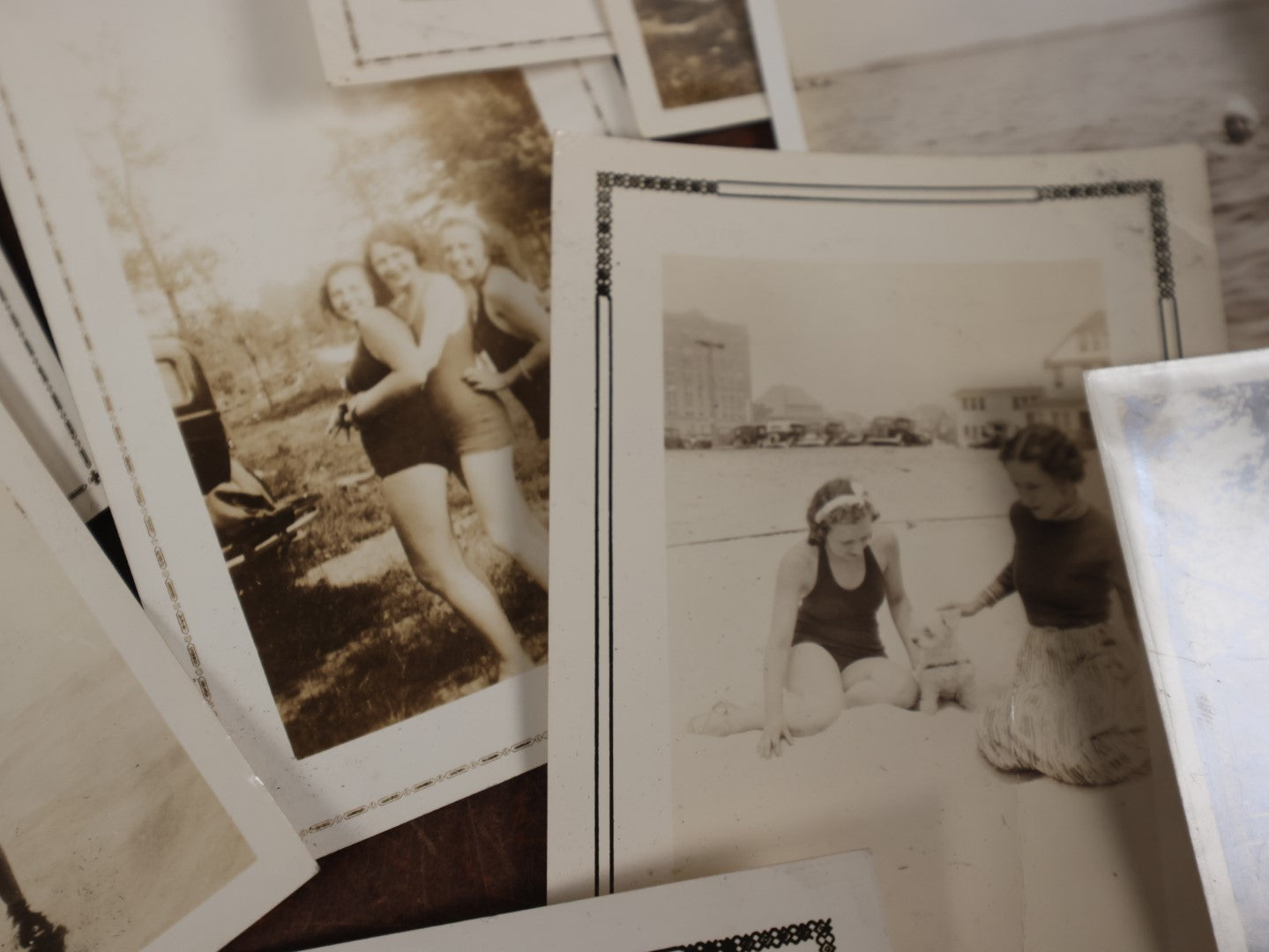 Lot 167 - Grouping Of Approximately 35 Vintage Snapshot Photos Of Women, Men, And Children At The Beach, Outdoors, In Swimsuits, Etc