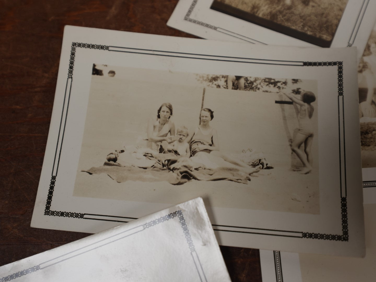 Lot 167 - Grouping Of Approximately 35 Vintage Snapshot Photos Of Women, Men, And Children At The Beach, Outdoors, In Swimsuits, Etc