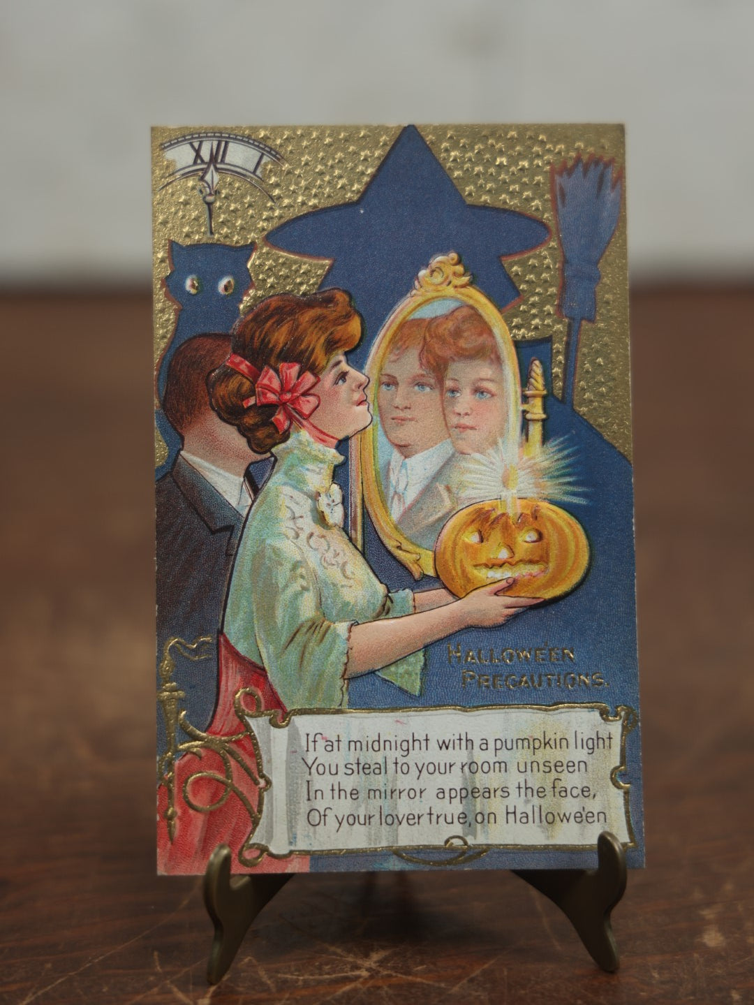 Lot 028 - Antique Embossed Halloween Postcard, Shadow Of Witch And Cat, Pretty Lady Holding Jack-O-Lantern, Looking In Mirror To See Husband, "Halloween Precautions," Halloween Series No. 2, No Writing