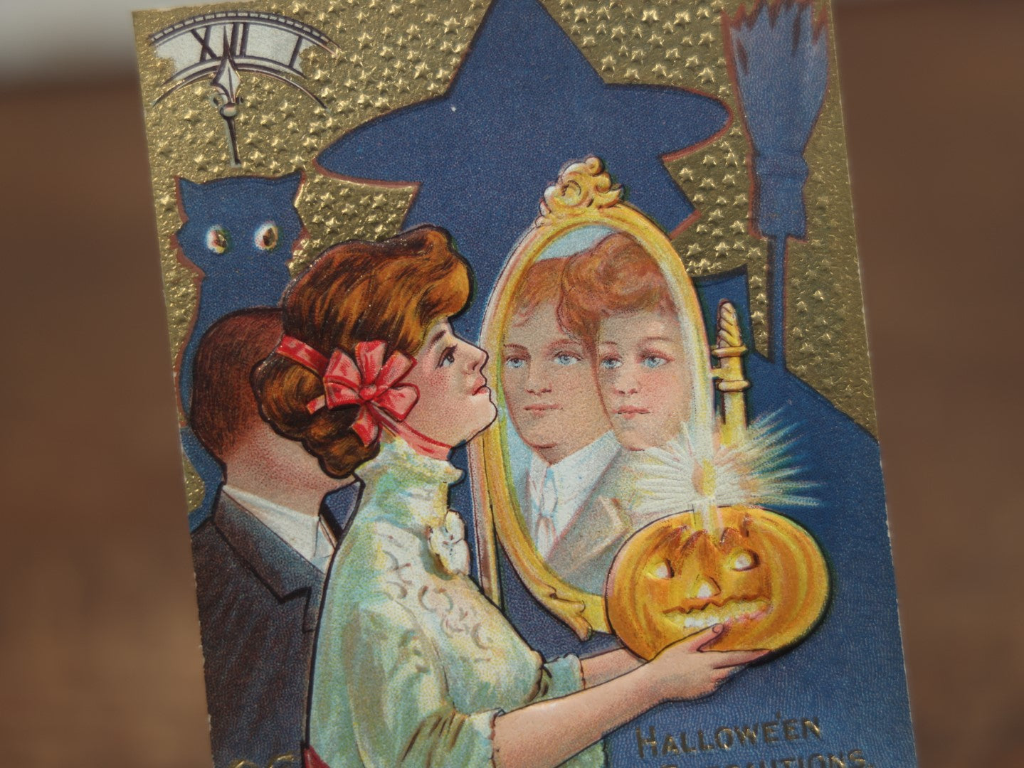 Lot 028 - Antique Embossed Halloween Postcard, Shadow Of Witch And Cat, Pretty Lady Holding Jack-O-Lantern, Looking In Mirror To See Husband, "Halloween Precautions," Halloween Series No. 2, No Writing